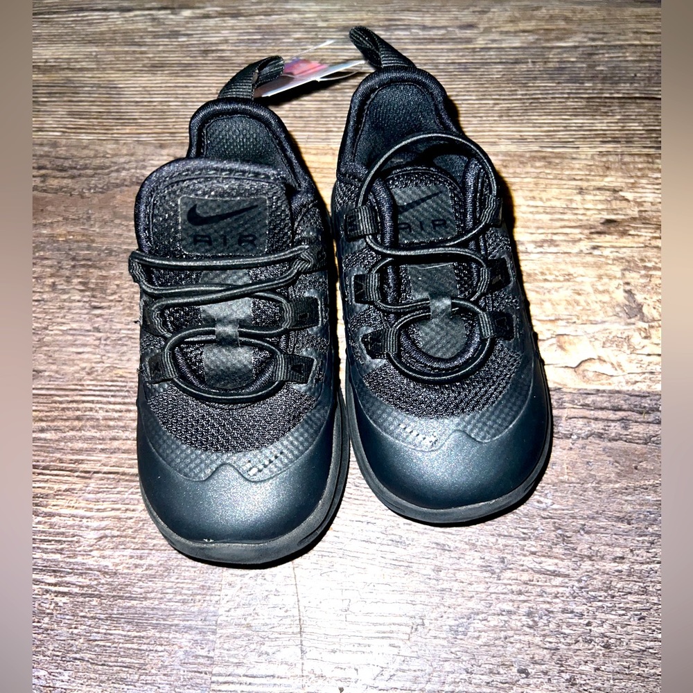 Gently used baby nike air size 5.